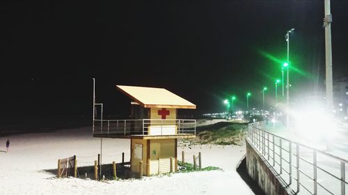 Illuminated street light at night