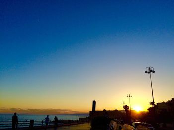 View of sunset over calm blue sea