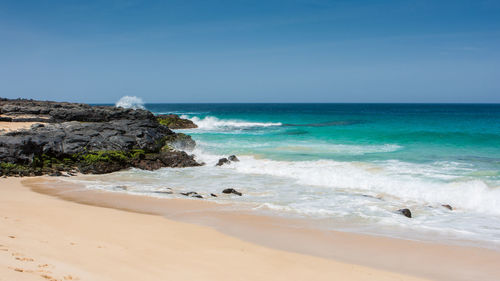 Scenic view of sea against clear sky