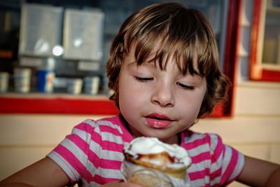 Close-up of girl with ice cream