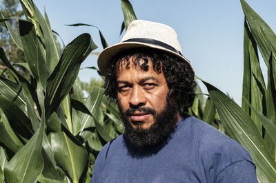 Portrait of african-american in the orchard.