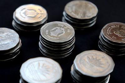 High angle view of coins on table