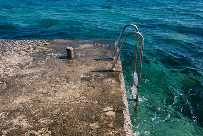 High angle view of swimming pool by sea