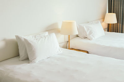 White pillows on beds at home