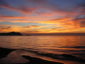 Scenic view of sea at sunset