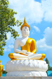 Low angle view of buddha statue