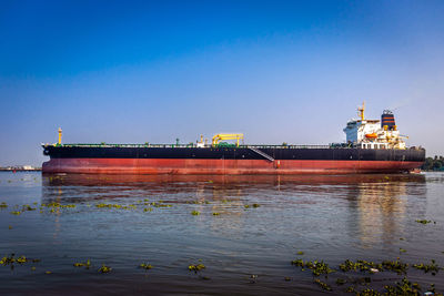 Huge cargo ship in the sea crossing kochi cost at kerala india.