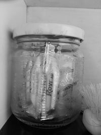 Close-up of glass jar on table