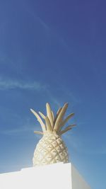Low angle view of building against blue sky