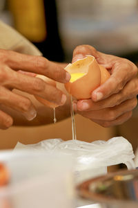 Close-up of hand holding ice cream