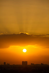 Scenic view of silhouette landscape against romantic sky at sunset