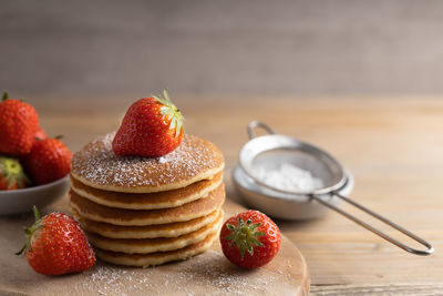 Close-up of strawberries on table