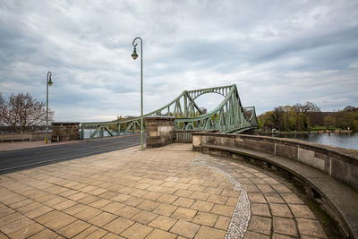 Bridge over river against sky