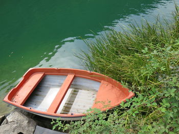 High angle view of ship moored at lakeshore