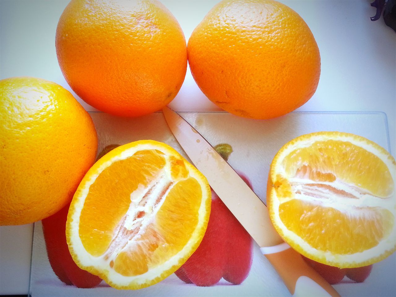 food and drink, food, freshness, healthy eating, fruit, yellow, orange - fruit, still life, citrus fruit, indoors, orange color, slice, table, close-up, lemon, cross section, organic, juicy, orange, high angle view