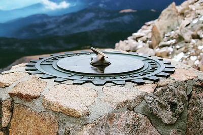 High angle view of rotary international sign on rocky mountain