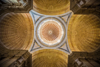 Low angle view of ornate ceiling of building