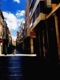 People walking on street in city