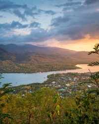 Scenic view of lake against sky during sunset