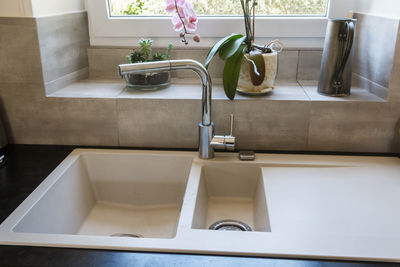 View of kitchen sink at home