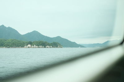 Scenic view of sea and mountains