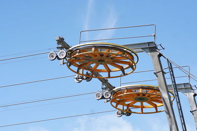 Low angle view of basketball hoop against clear blue sky