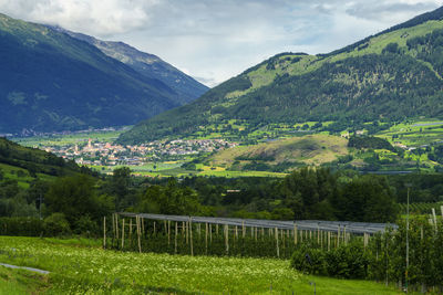 Scenic view of landscape and mountains against sky