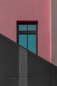 Abstract shapes of building with sky seen through window