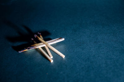 High angle view of wooden table against blue sky