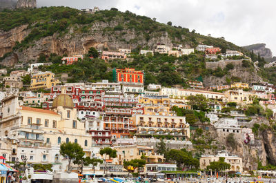 Church of santa maria assunta with flowers in positano, amalfi coast, italy