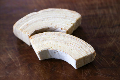 High angle view of bread on cutting board