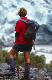 Woman standing on rock