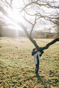 Full length of boy on field