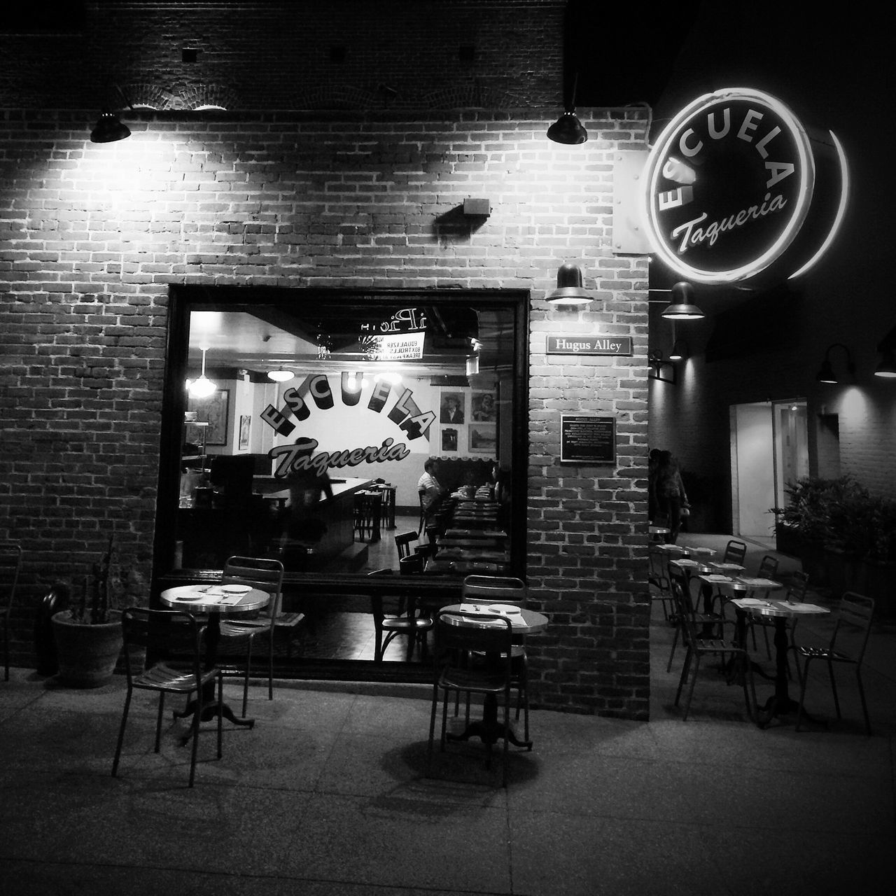 indoors, architecture, chair, table, built structure, empty, absence, house, building exterior, wood - material, day, restaurant, circle, no people, window, cafe, wall - building feature, furniture, arrangement, potted plant