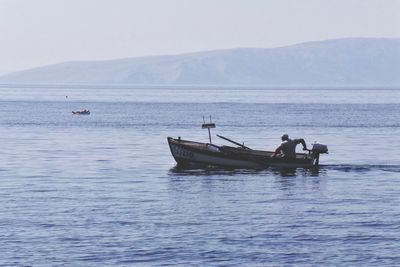 Boat sailing in sea