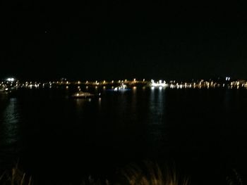 Reflection of illuminated buildings in water