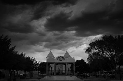 Built structure against cloudy sky