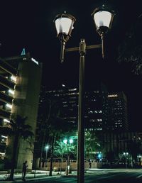 Illuminated street light at night