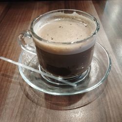 Close-up of coffee cup on table