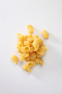 Gomiti rigati dry pasta on the white background
