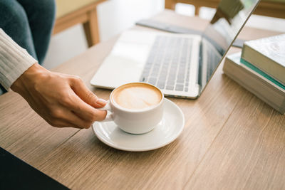 Coffee cup on table