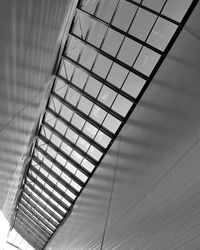 Low angle view of glass ceiling in building