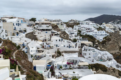 High angle view of buildings in city against sky