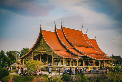 Panoramic view of temple against building