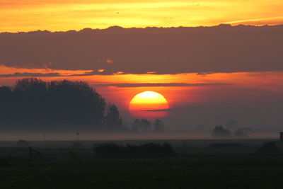 Scenic view of sunset sky during sunrise