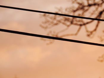 Close-up of water against sky at sunset