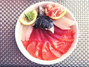 Directly above shot of sashimi served on plate