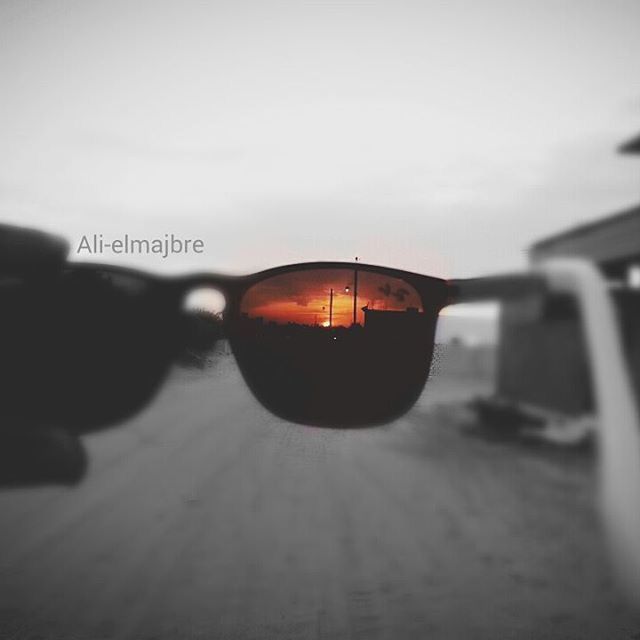 text, sunset, communication, transportation, sky, western script, clear sky, close-up, focus on foreground, reflection, copy space, outdoors, mode of transport, land vehicle, street, dusk, built structure, car