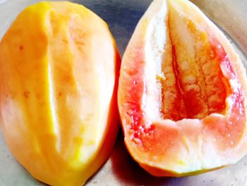 Close-up of orange slices on table