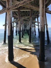 View of wooden pier on sea